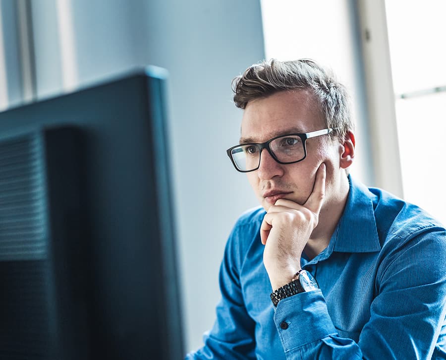 A man is using pharmacy benefit technology from RxSense