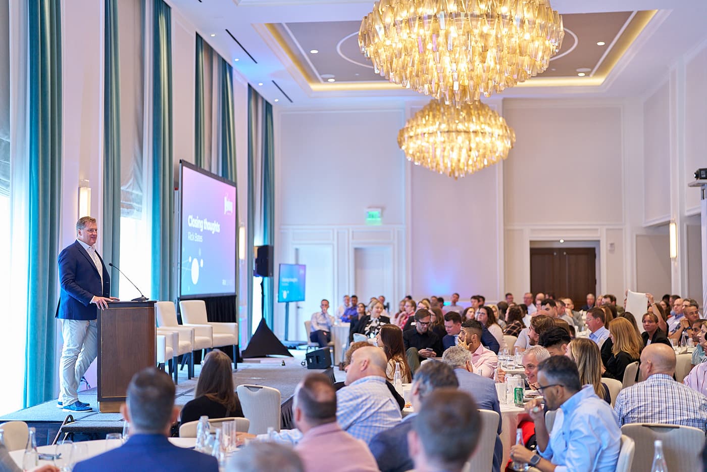 Rick Bates speaking to an employee audience at an RxSense company event in Boston, MA.