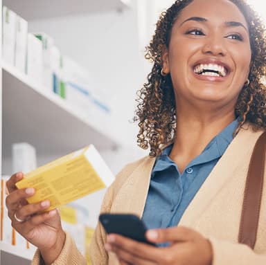 A woman getting critical, real time information about her prescription from her mobile phone.