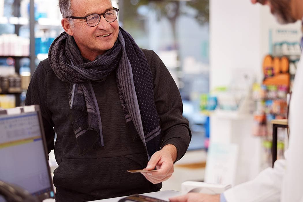 Customer picks up a lower cost prescription using SingleCare