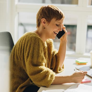 A person on their mobile device getting best-in-class support while planning and iterating.
