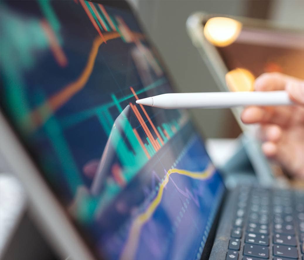 A user looks at the analytics and positive trends from RxSense's RxIQ Price AI's automation.